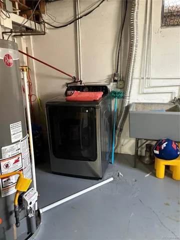 a bathroom with a sink a toilet and a shower