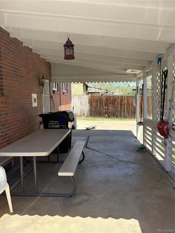 a swimming pool with outdoor seating