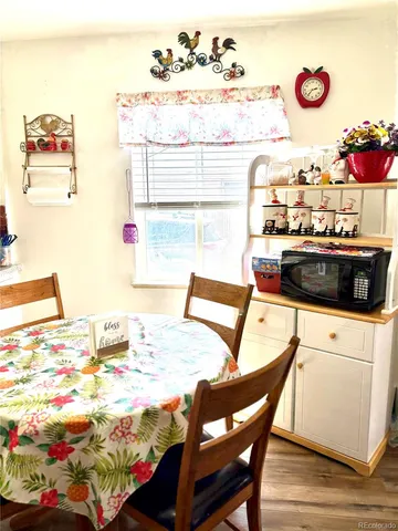 a view of a dining room with furniture
