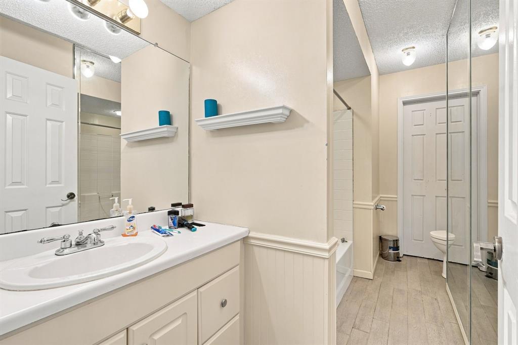 9732 Timber Trail Scurry, TX 75158 - Photo 24 of 39 Upstairs full bath vanity