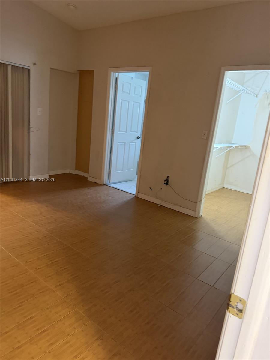 13752 Southwest 156th Street Miami, FL 33177 - Photo 9 of 14 an empty room with windows