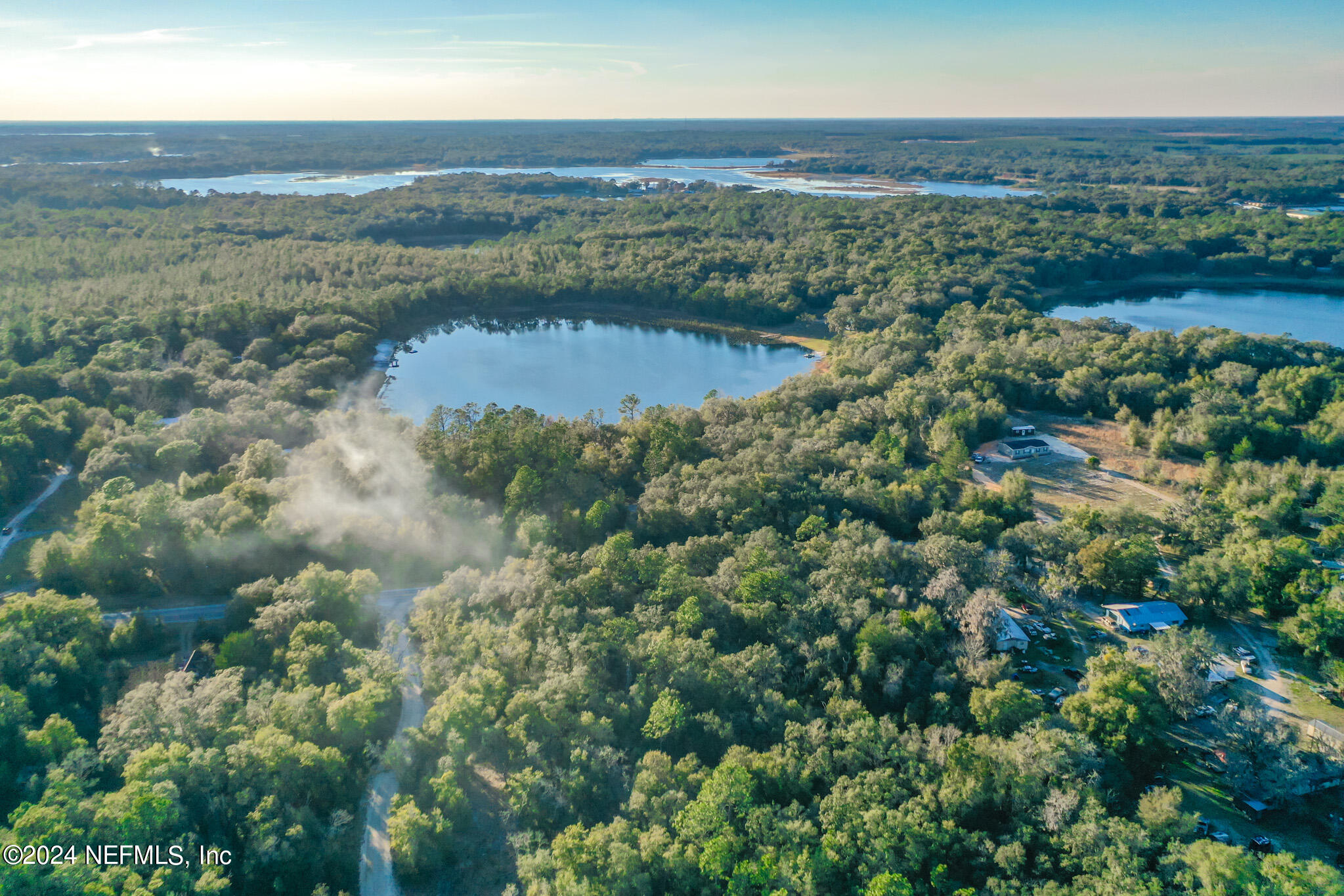 200 County Road 21 Hawthorne, FL 32640 - Photo 2 of 7 an aerial view of valley and lake