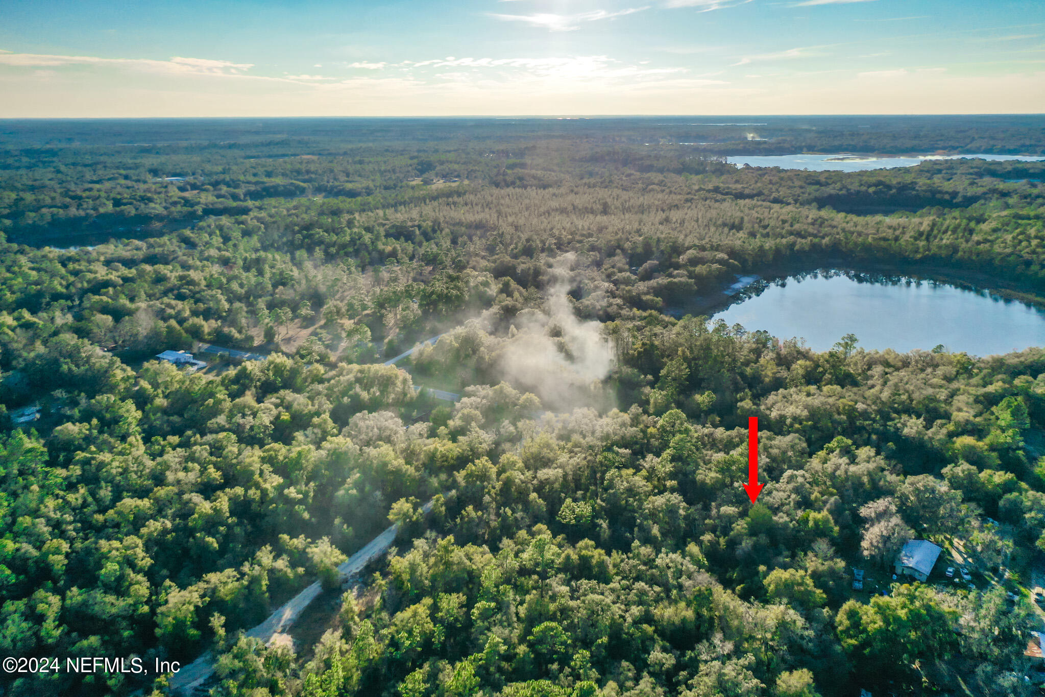 200 County Road 21 Hawthorne, FL 32640 - Photo 3 of 7 an aerial view of residential house with outdoor space and trees around