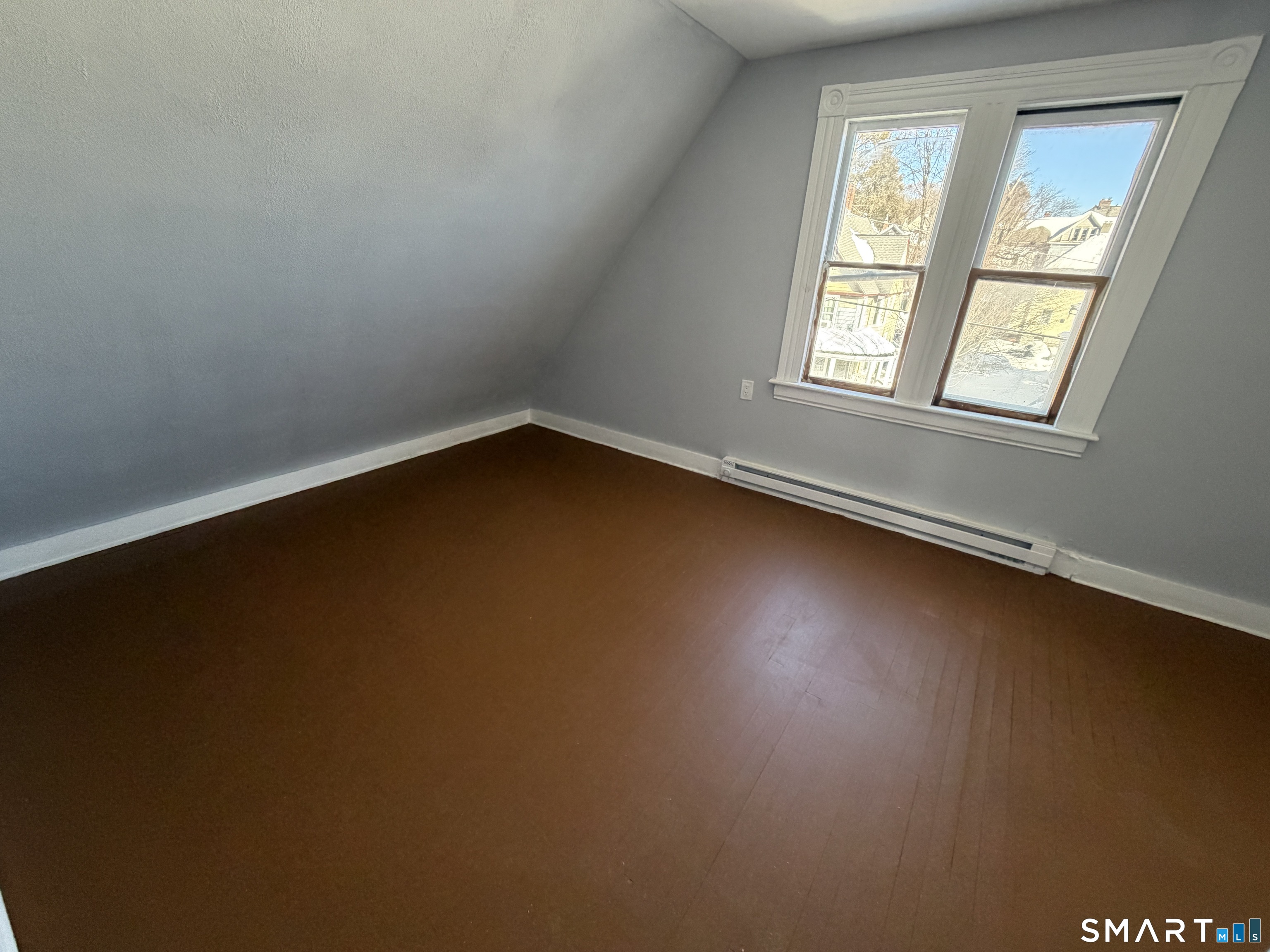 73 Waterville Street, Unit 3 Waterbury, CT 06710 - Photo 6 of 9 an empty room with a window