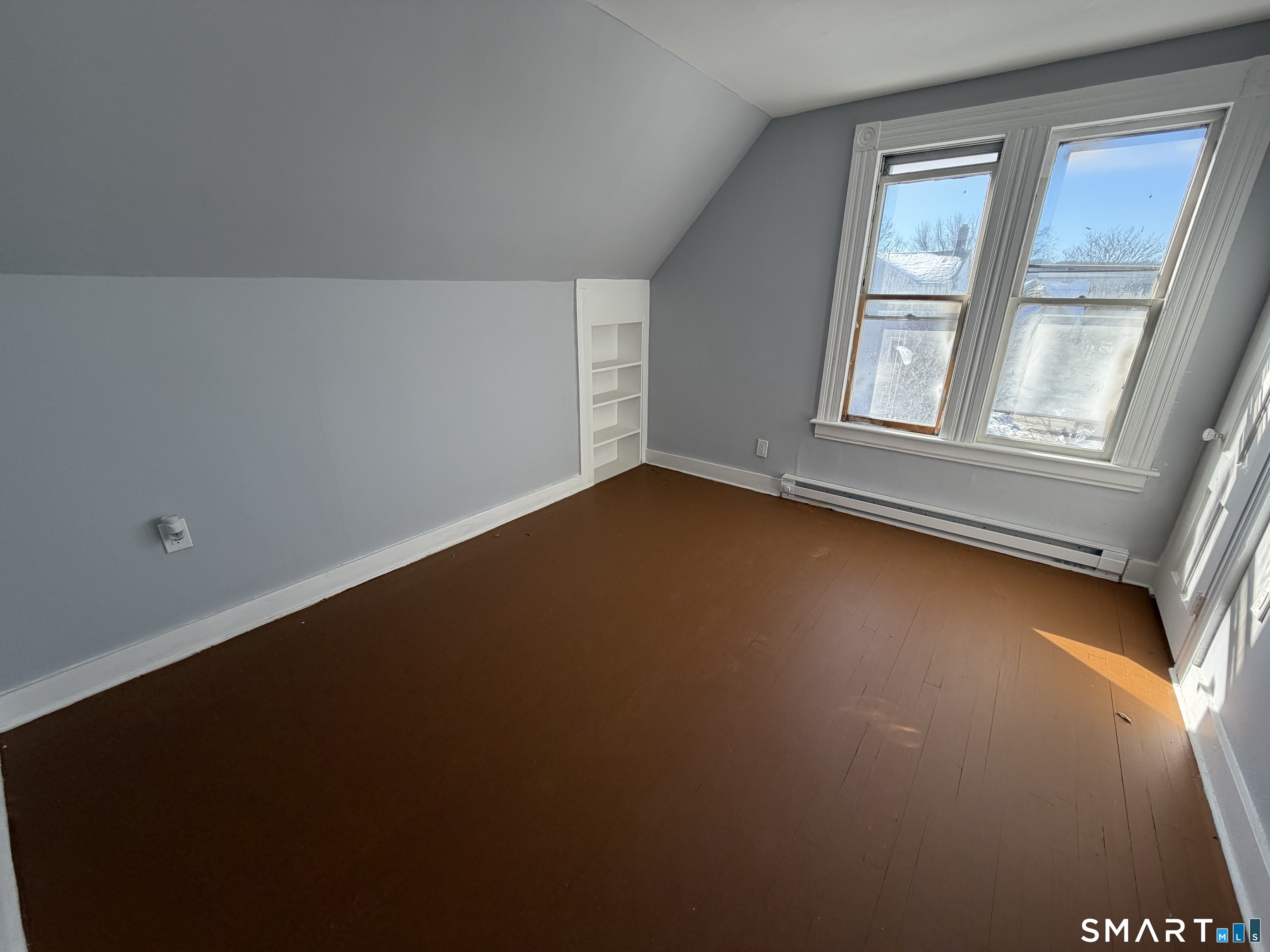 73 Waterville Street, Unit 3 Waterbury, CT 06710 - Photo 8 of 9 an empty room with a window