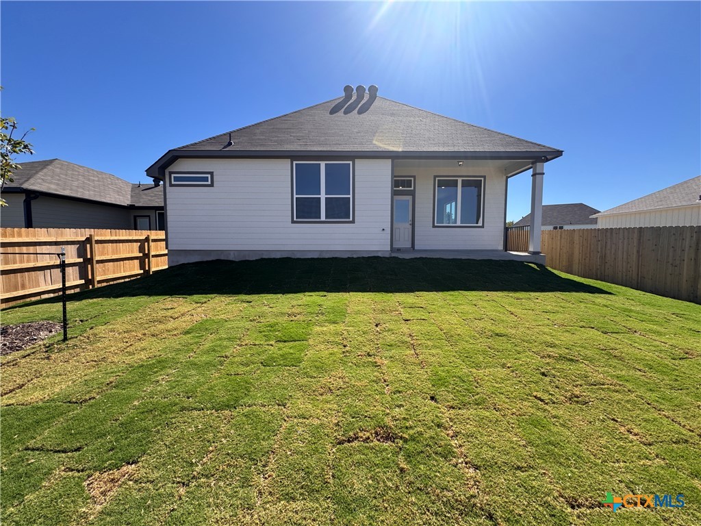 310 University Avenue Troy, TX 76579 - Photo 20 of 21 a front view of a house with garden
