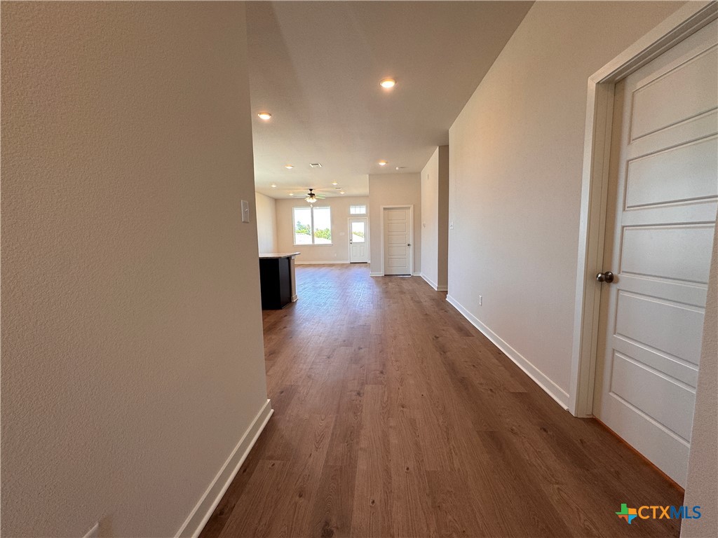 310 University Avenue Troy, TX 76579 - Photo 5 of 21 a view of a hallway with wooden floor