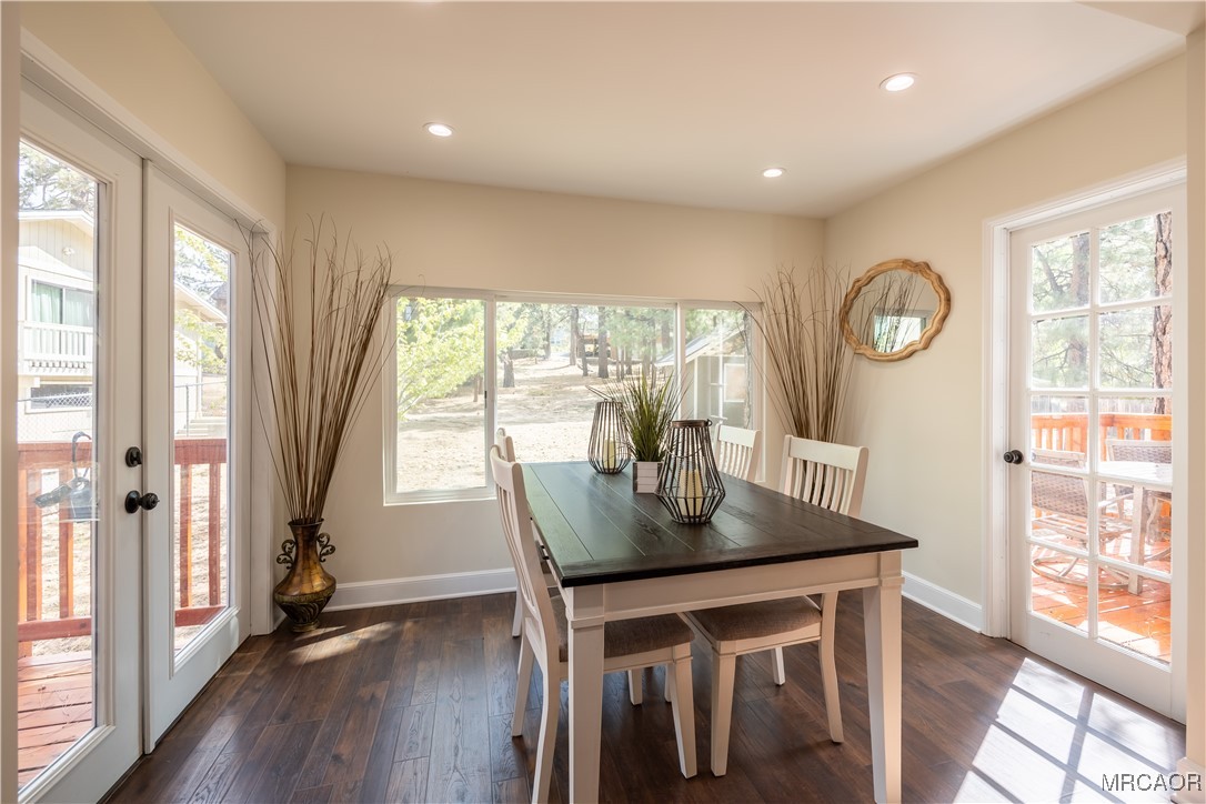 195 Elgin Road Big Bear Lake, CA 92315 - Photo 10 of 40 a view of kitchen with granite countertop a dining table chairs in front of the house