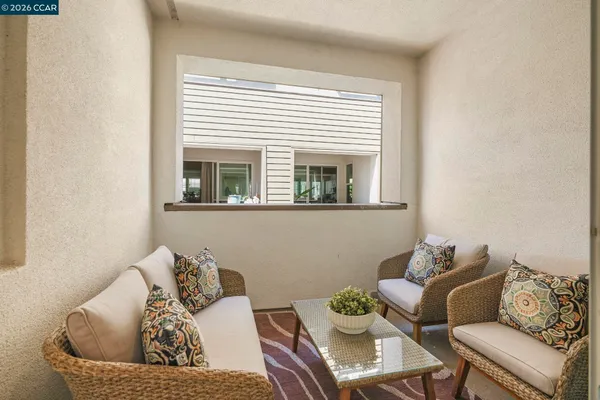 a kitchen with stainless steel appliances a sink refrigerator and cabinets