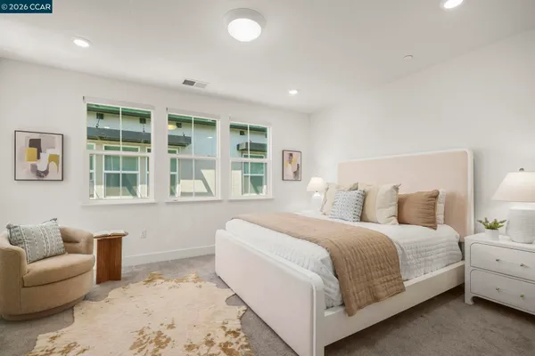 a view of a street with a building in the background