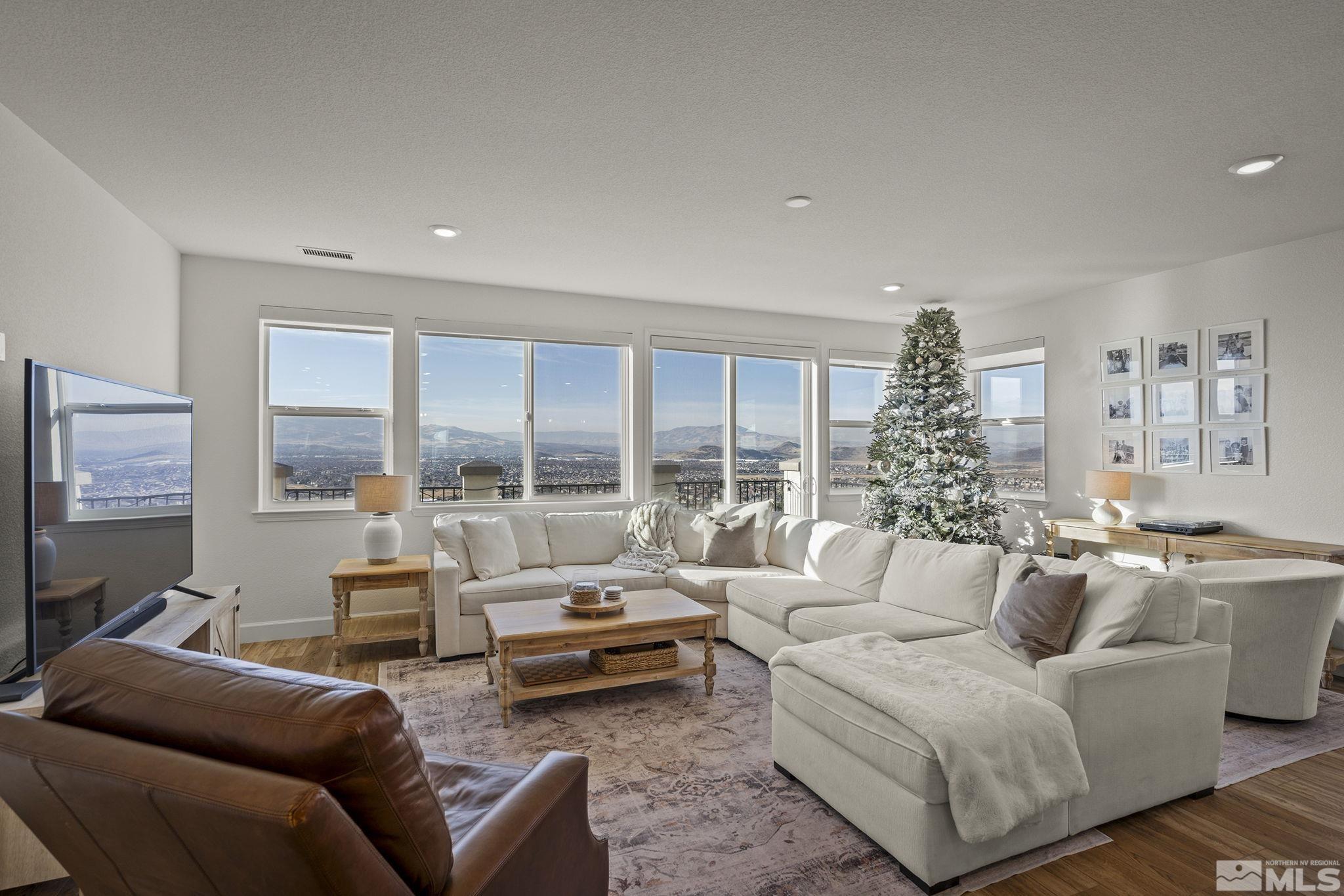 10489 Claim Jumper Way Reno, NV 89521 - Photo 12 of 40 a living room with furniture and a large window