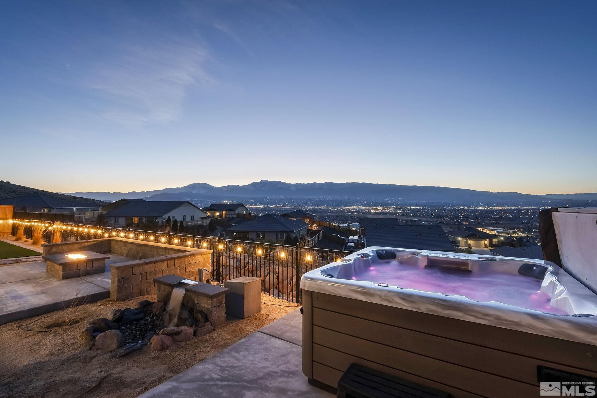 10489 Claim Jumper Way Reno, NV 89521 - Photo 3 of 40 a terrace with outdoor seating and city view