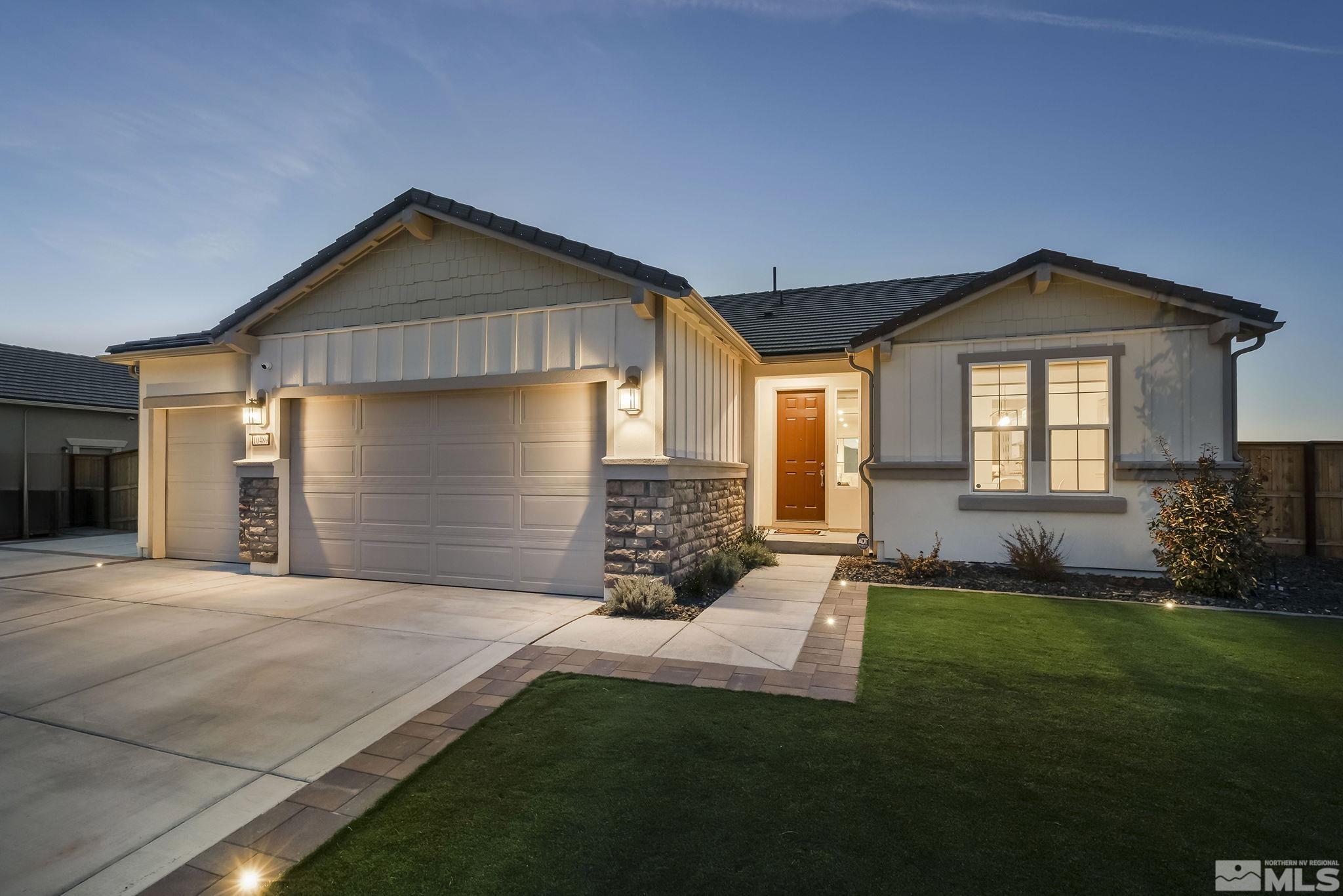 10489 Claim Jumper Way Reno, NV 89521 - Photo 8 of 40 a front view of a house with a yard