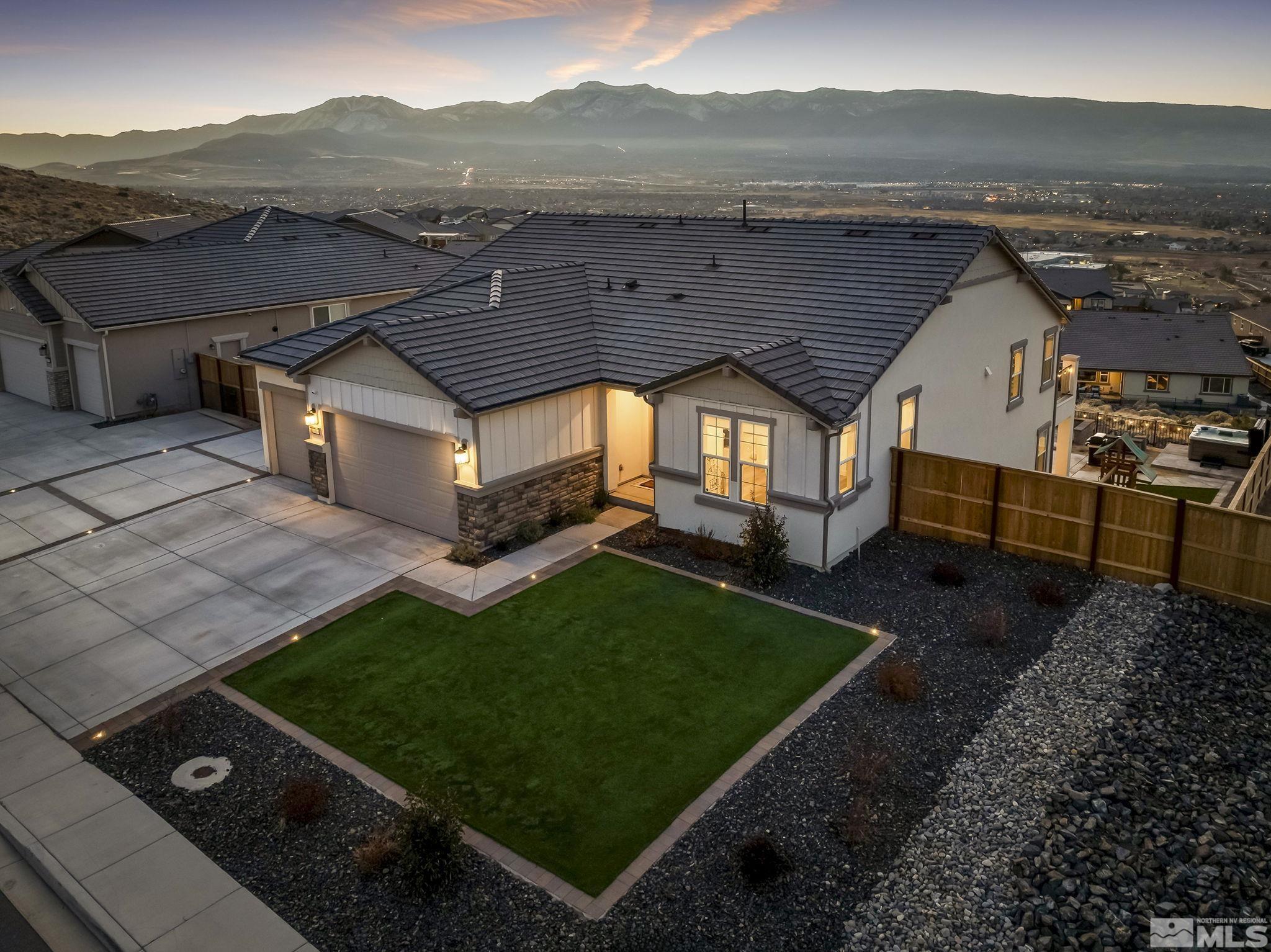 10489 Claim Jumper Way Reno, NV 89521 - Photo 9 of 40 a view of a backyard with sitting area