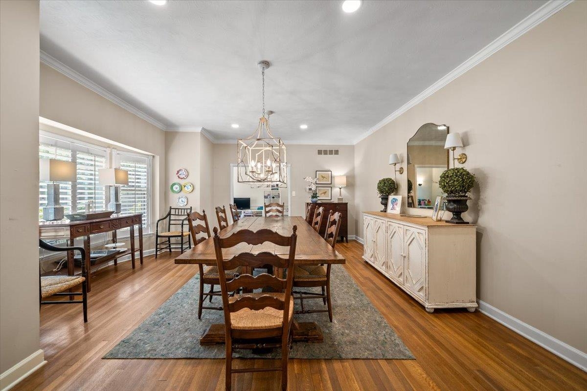 1273 Brookfield Road Memphis, TN 38119 - Photo 7 of 40 Large formal dining space featuring hardwood flooring and crown molding