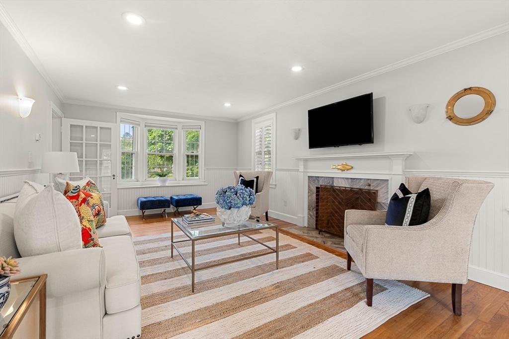 6 Shetland Road Marblehead, MA 01945 - Photo 6 of 39 a living room with furniture and a flat screen tv