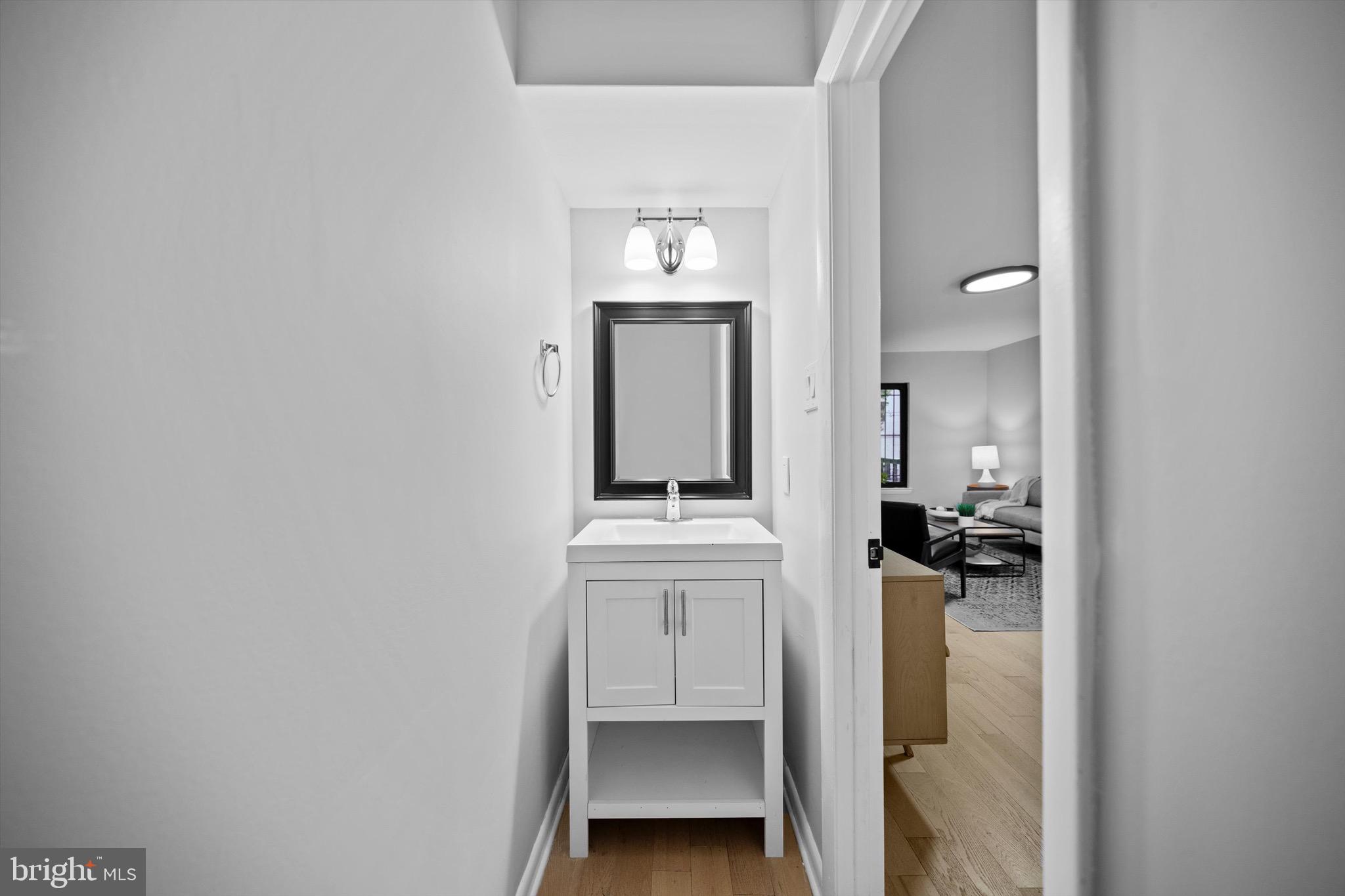 3114 Berry Road Northeast, Unit 21 Washington, DC 20018 - Photo 13 of 25 a view of a hallway with a dining room