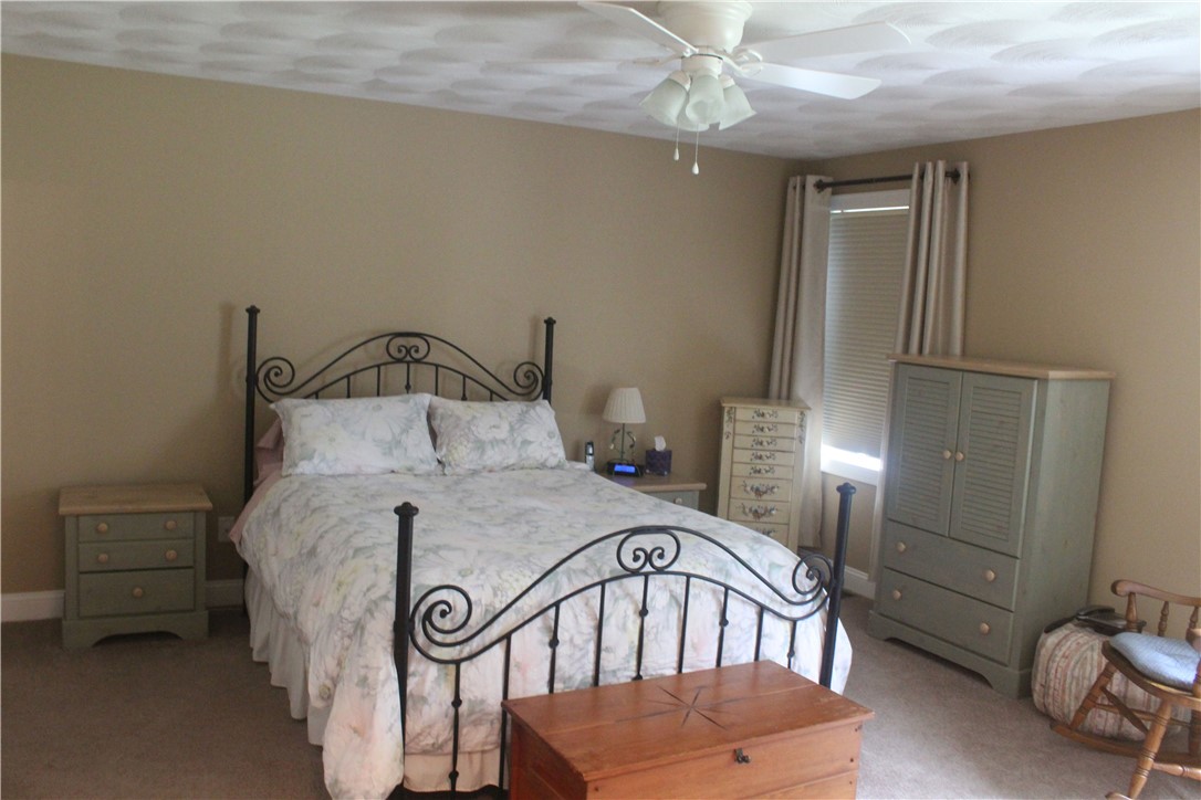95 Roland Robinson Way North Kingstown, RI 02852 - Photo 6 of 19 Master bedroom with 2 double closets, wall to wall carpet and ensuite.