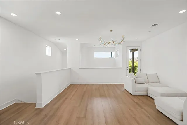 a view of livingroom and hardwood floor