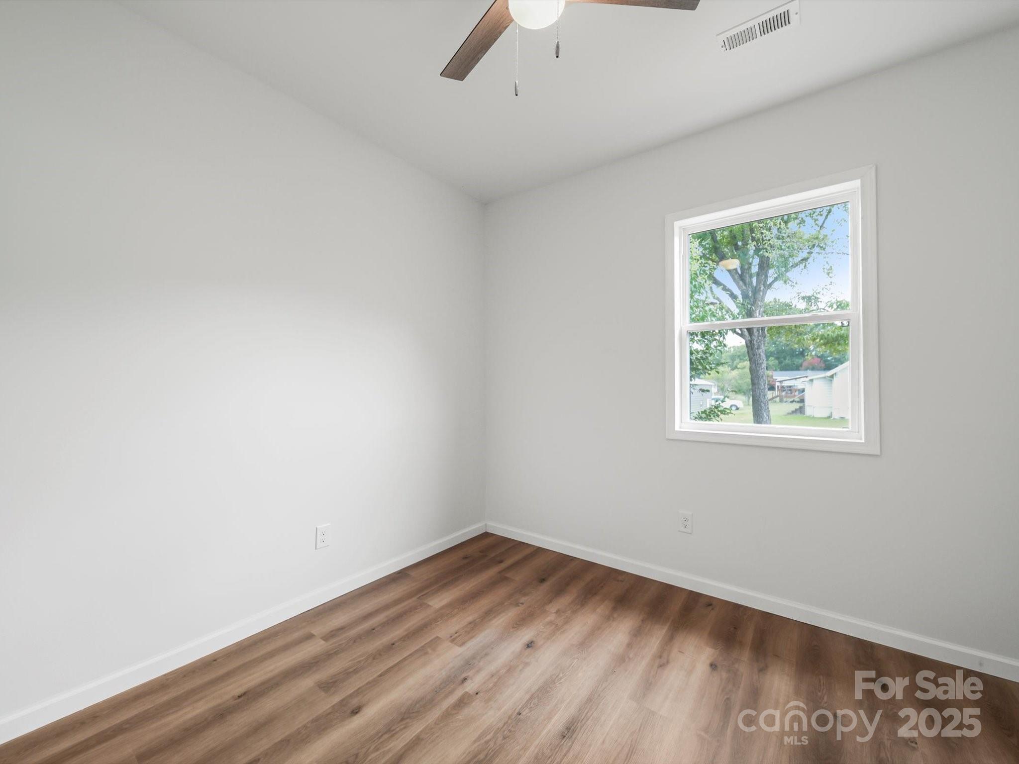 334 South Pink Street Cherryville, NC 28021 - Photo 22 of 25 an empty room with a window