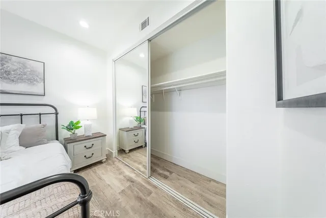 a room with a bed and a window