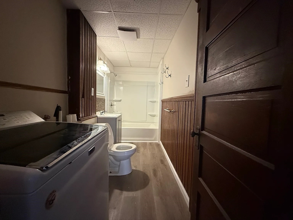 38 Ames Street, Unit 2 Worcester, MA 01610 - Photo 5 of 9 a view of a hallway with wooden floor