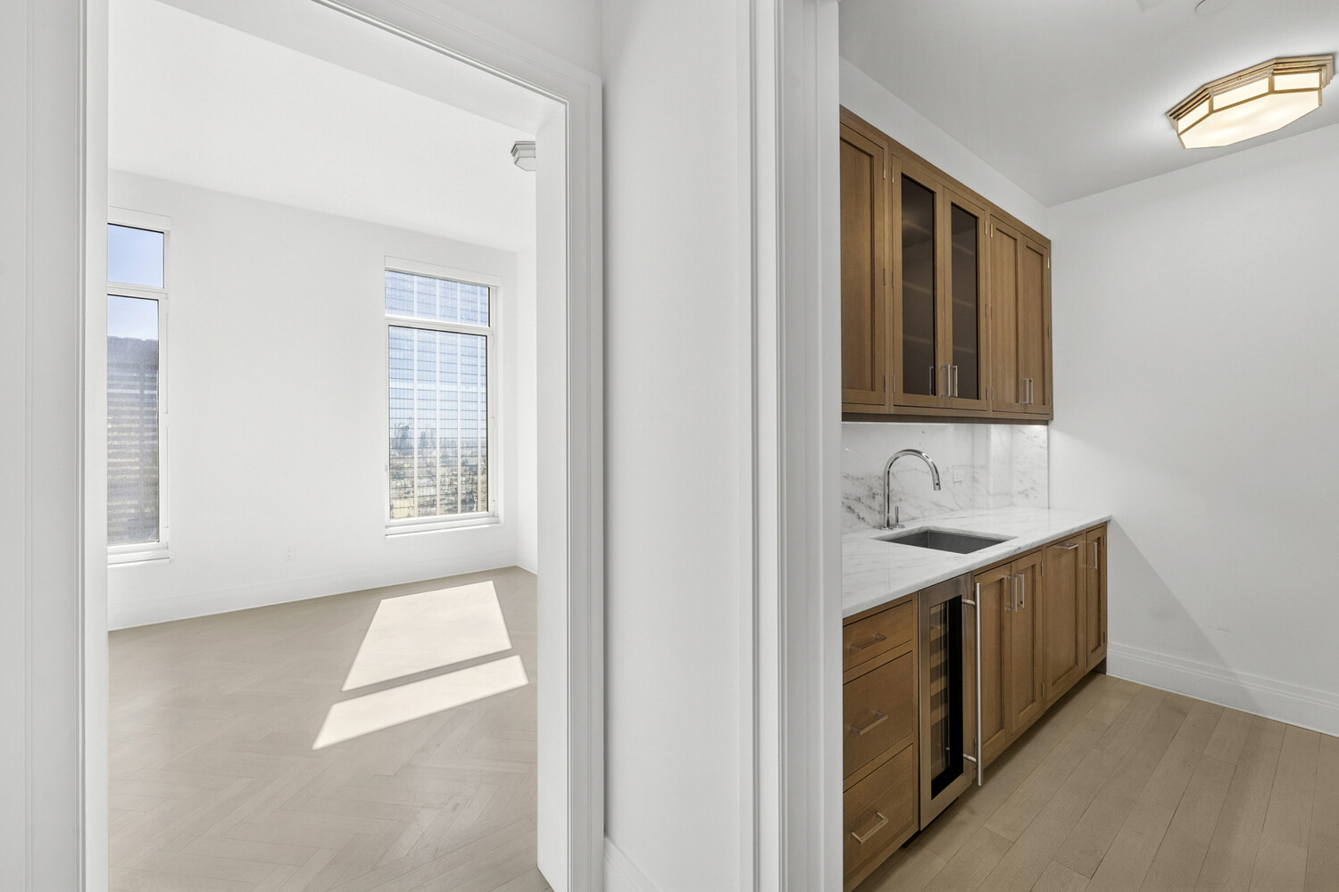 30 Park Place, Unit 61C Manhattan, NY 10007 - Photo 6 of 14 a bathroom with a sink a mirror and a bathtub