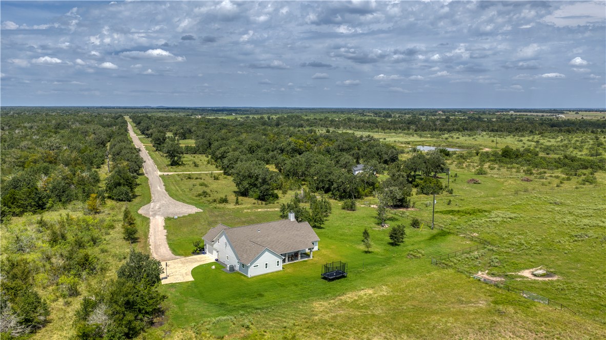 7105 Watermelon Road Somerville, TX 77879 - Photo 2 of 40 a view of outdoor space and yard