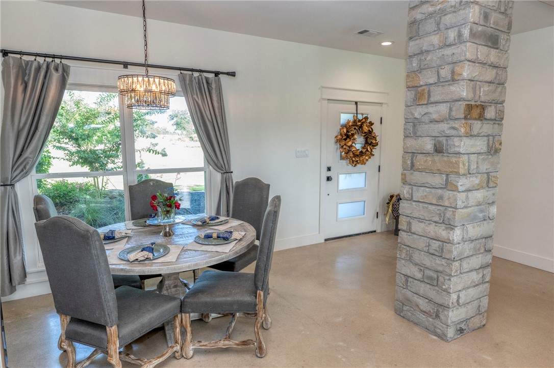 7105 Watermelon Road Somerville, TX 77879 - Photo 7 of 40 a dining room with furniture and window