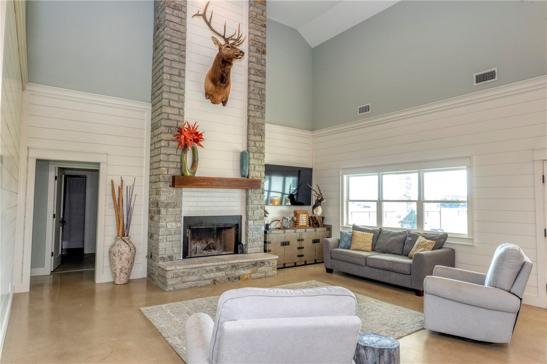 7105 Watermelon Road Somerville, TX 77879 - Photo 9 of 40 a living room with furniture or fireplace and a window