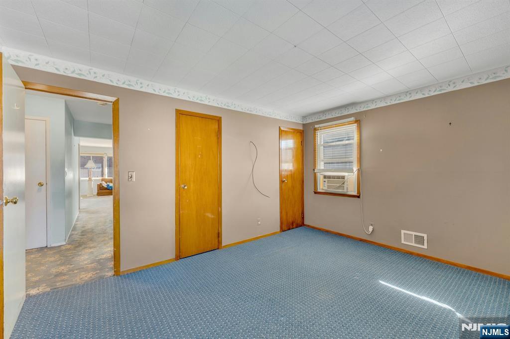 18 Ferncliff Road Jersey City, NJ 07305 - Photo 13 of 33 an empty room with windows