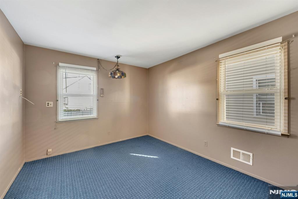18 Ferncliff Road Jersey City, NJ 07305 - Photo 14 of 33 a view of an empty room with a window