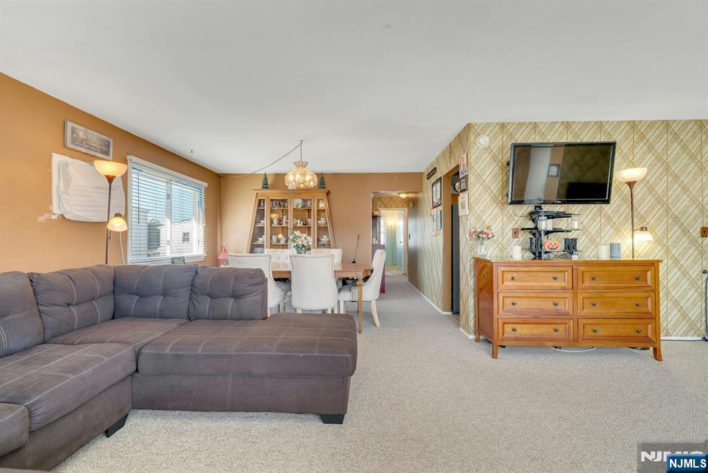 18 Ferncliff Road Jersey City, NJ 07305 - Photo 20 of 33 a living room with furniture and a flat screen tv