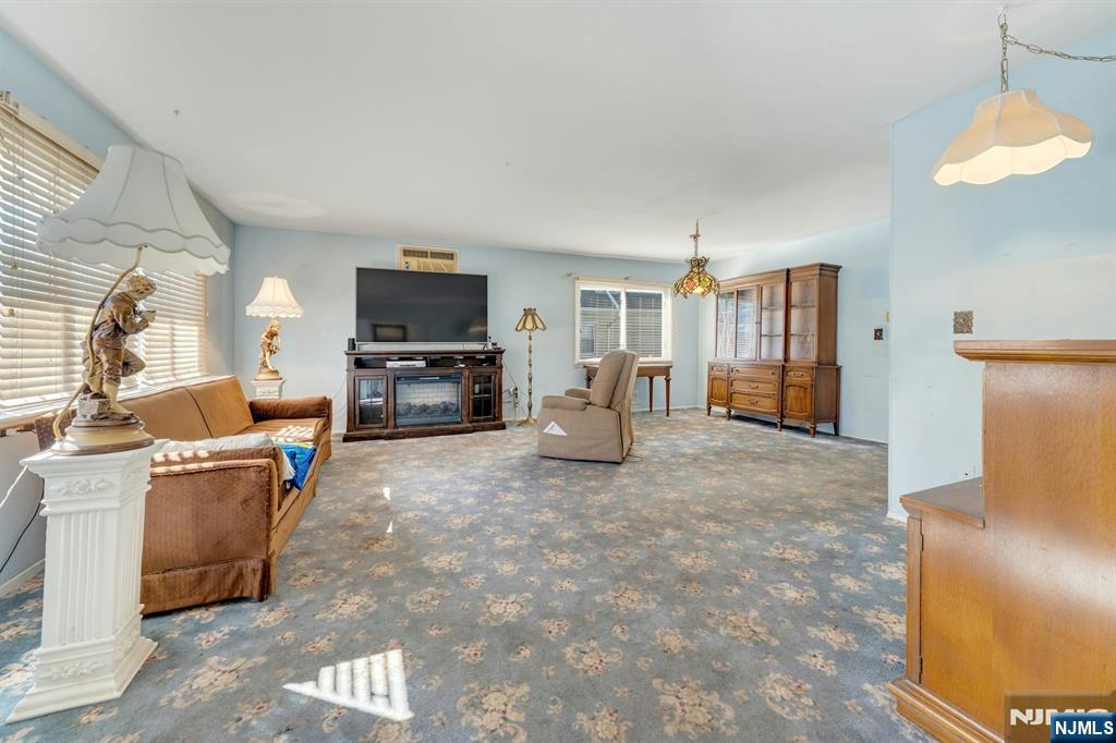 18 Ferncliff Road Jersey City, NJ 07305 - Photo 3 of 33 a living room with furniture and a flat screen tv