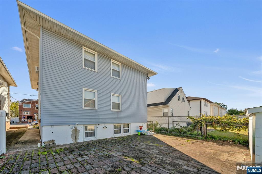 18 Ferncliff Road Jersey City, NJ 07305 - Photo 31 of 33 a front view of a house with a yard