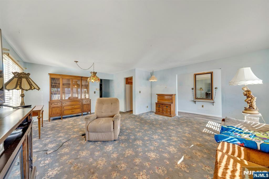 18 Ferncliff Road Jersey City, NJ 07305 - Photo 4 of 33 a living room with furniture and a flat screen tv