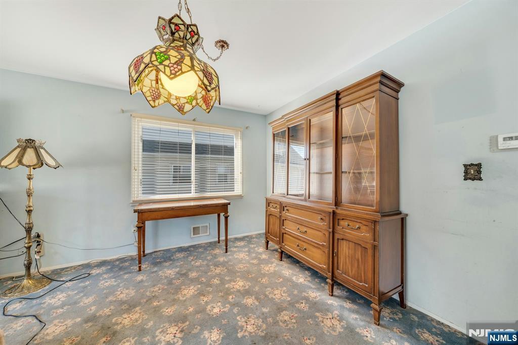 18 Ferncliff Road Jersey City, NJ 07305 - Photo 5 of 33 a view of a livingroom with furniture and a window