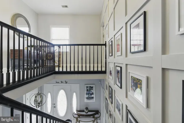 a view of an entryway with a staircase