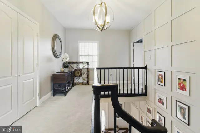a view of a livingroom with furniture and a window