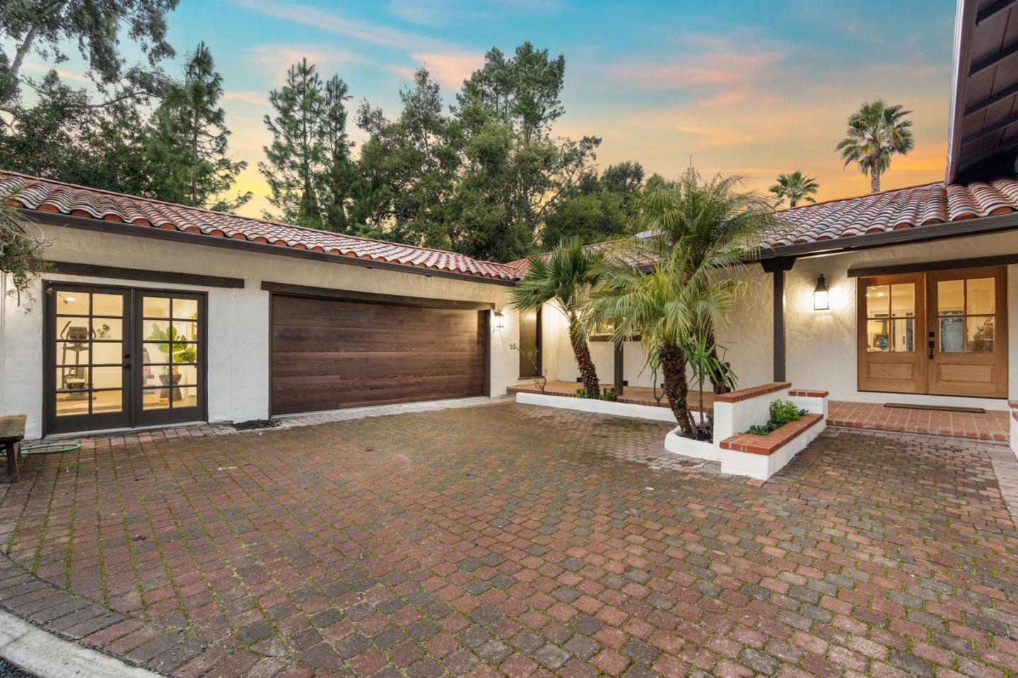 26645 Altamont Road Los Altos Hills, CA 94022 - Photo 2 of 60 a view of a house with backyard and parking area