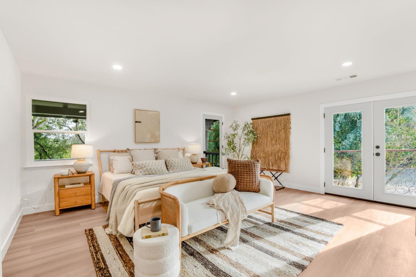 26645 Altamont Road Los Altos Hills, CA 94022 - Photo 23 of 60 a bedroom with a bed and large windows