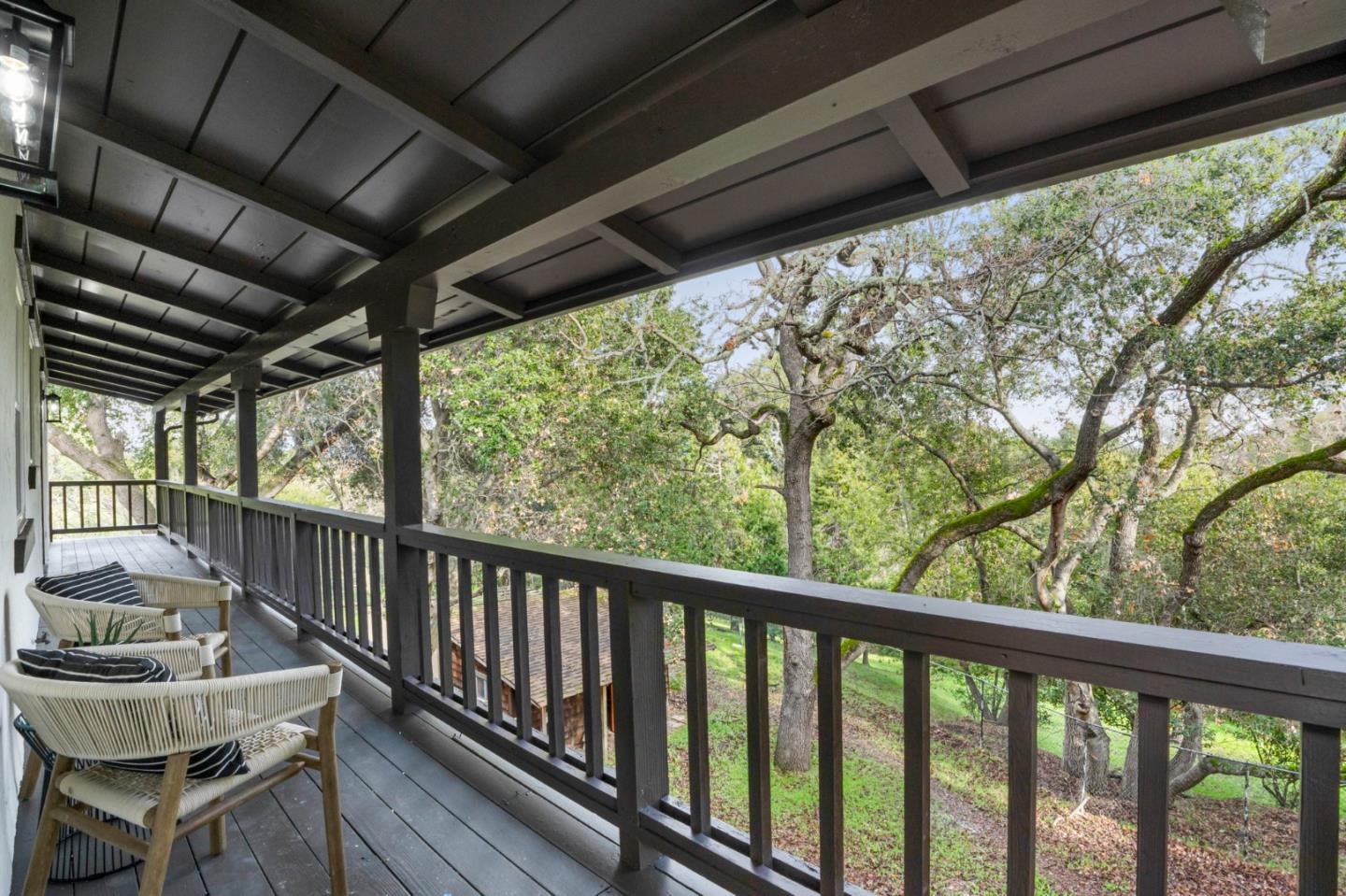 26645 Altamont Road Los Altos Hills, CA 94022 - Photo 33 of 60 a view of a porch with furniture