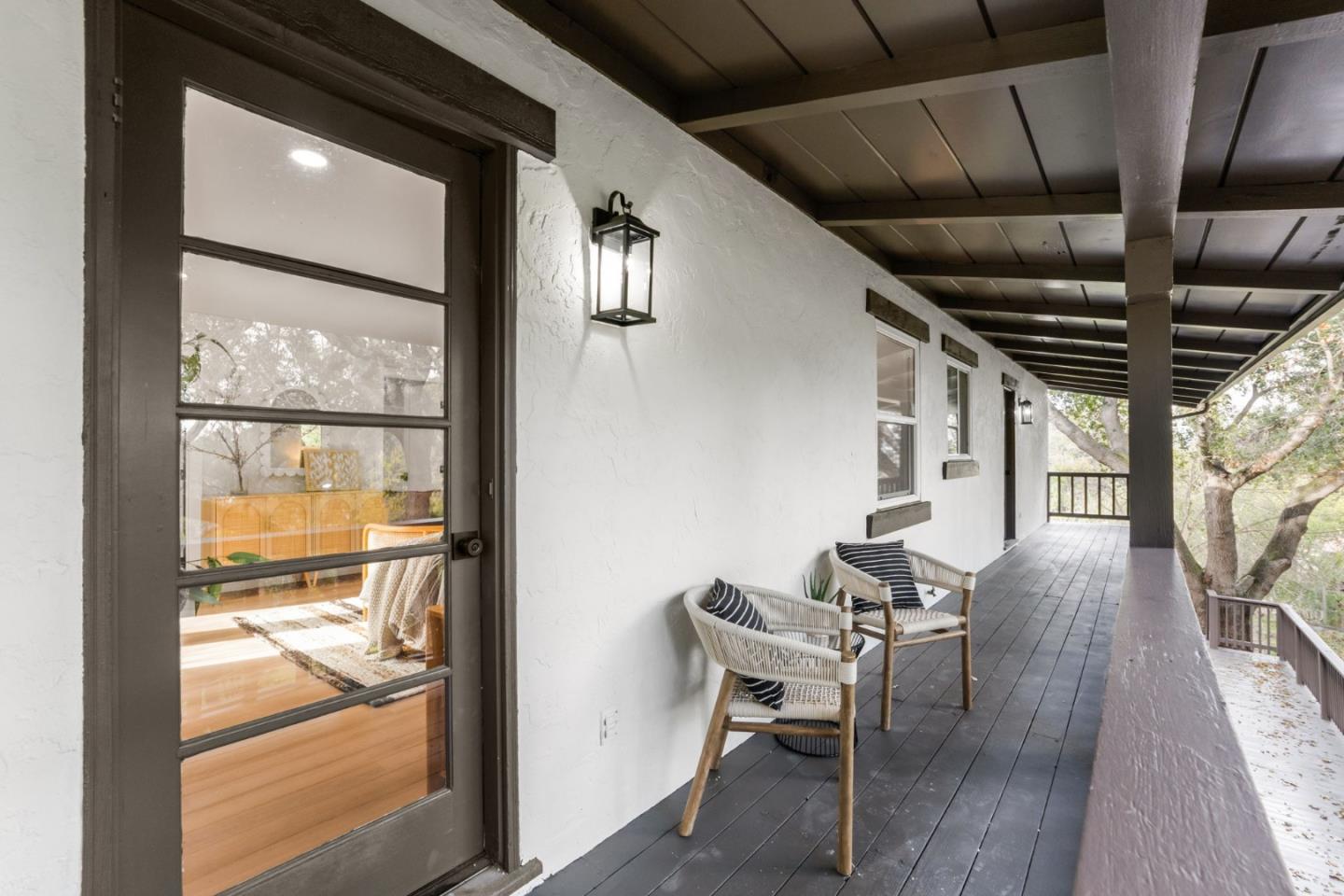 26645 Altamont Road Los Altos Hills, CA 94022 - Photo 42 of 60 a view of a porch with furniture and wooden floor