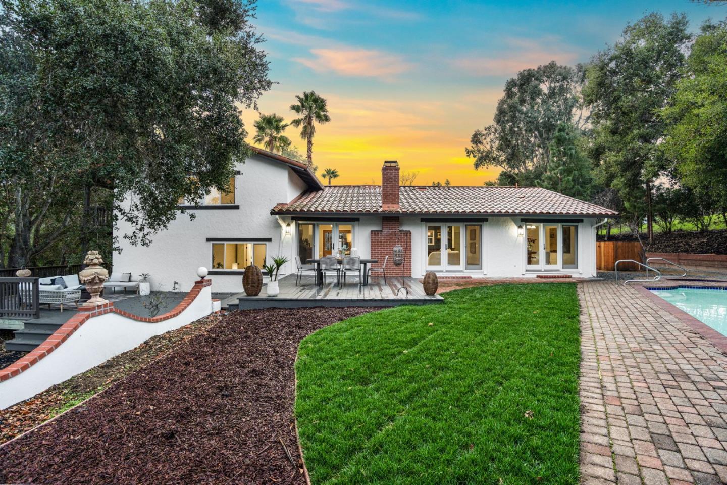 26645 Altamont Road Los Altos Hills, CA 94022 - Photo 46 of 60 a front view of a house with garden