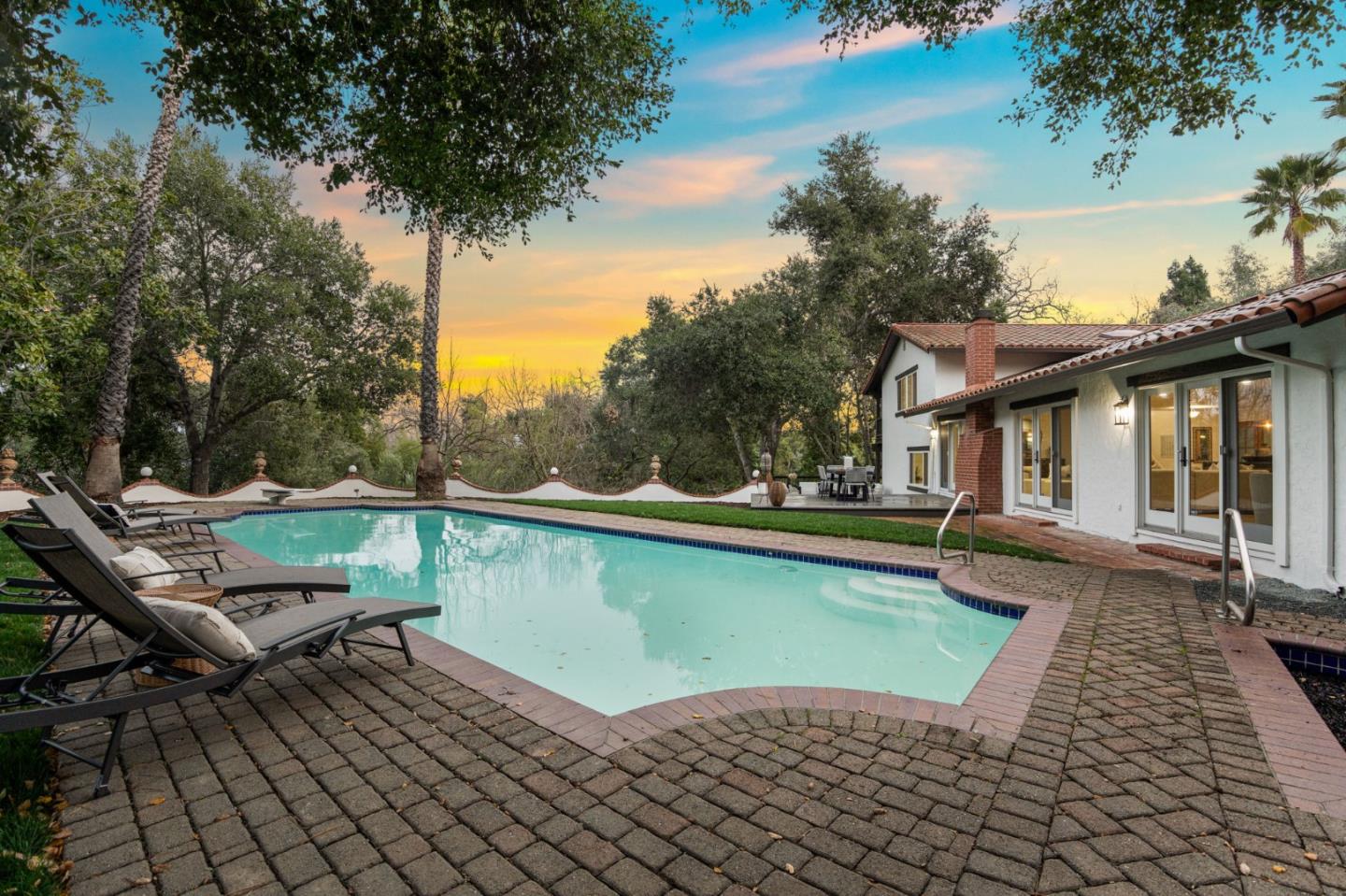 26645 Altamont Road Los Altos Hills, CA 94022 - Photo 47 of 60 a view of a swimming pool with lounge chair