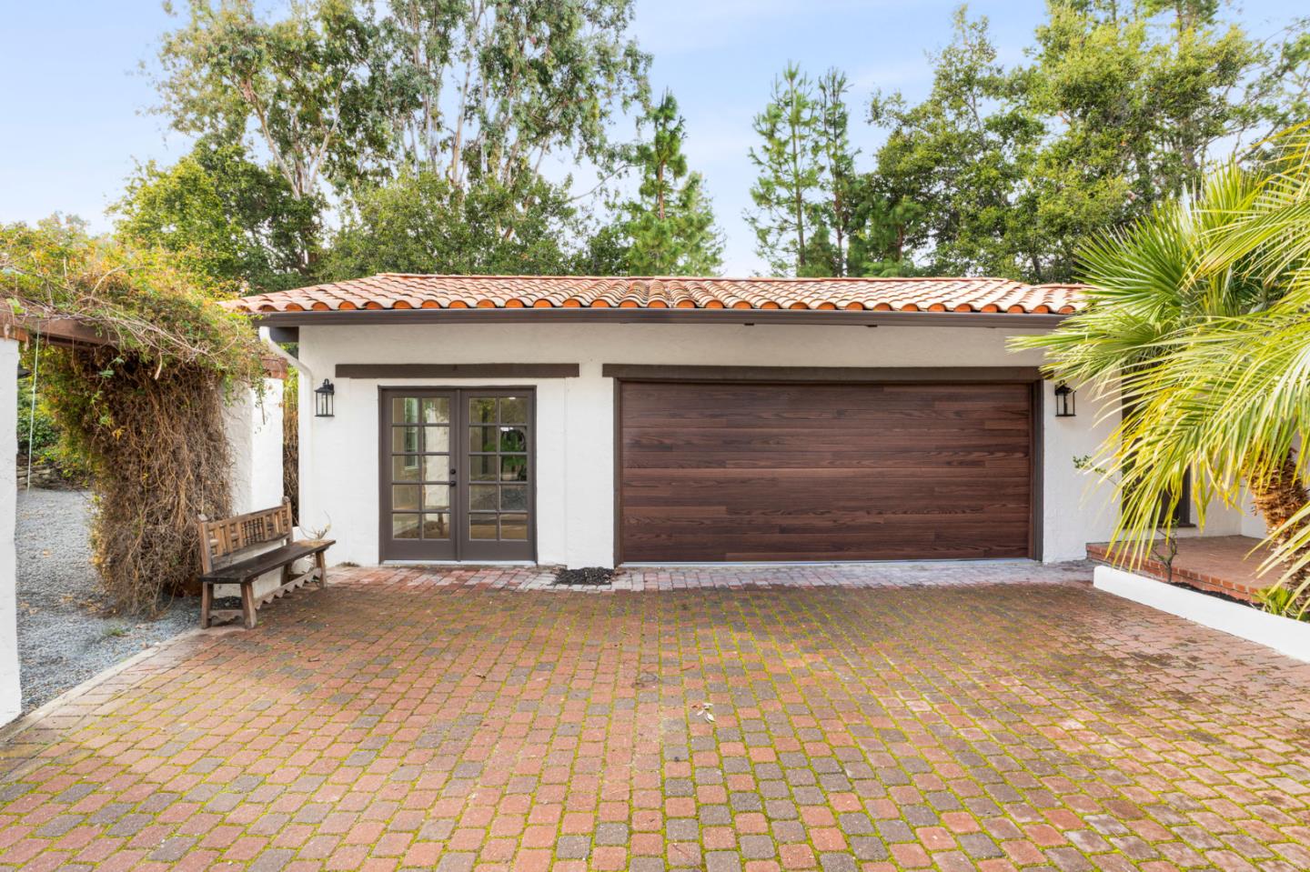 26645 Altamont Road Los Altos Hills, CA 94022 - Photo 5 of 60 a front view of a house with a yard