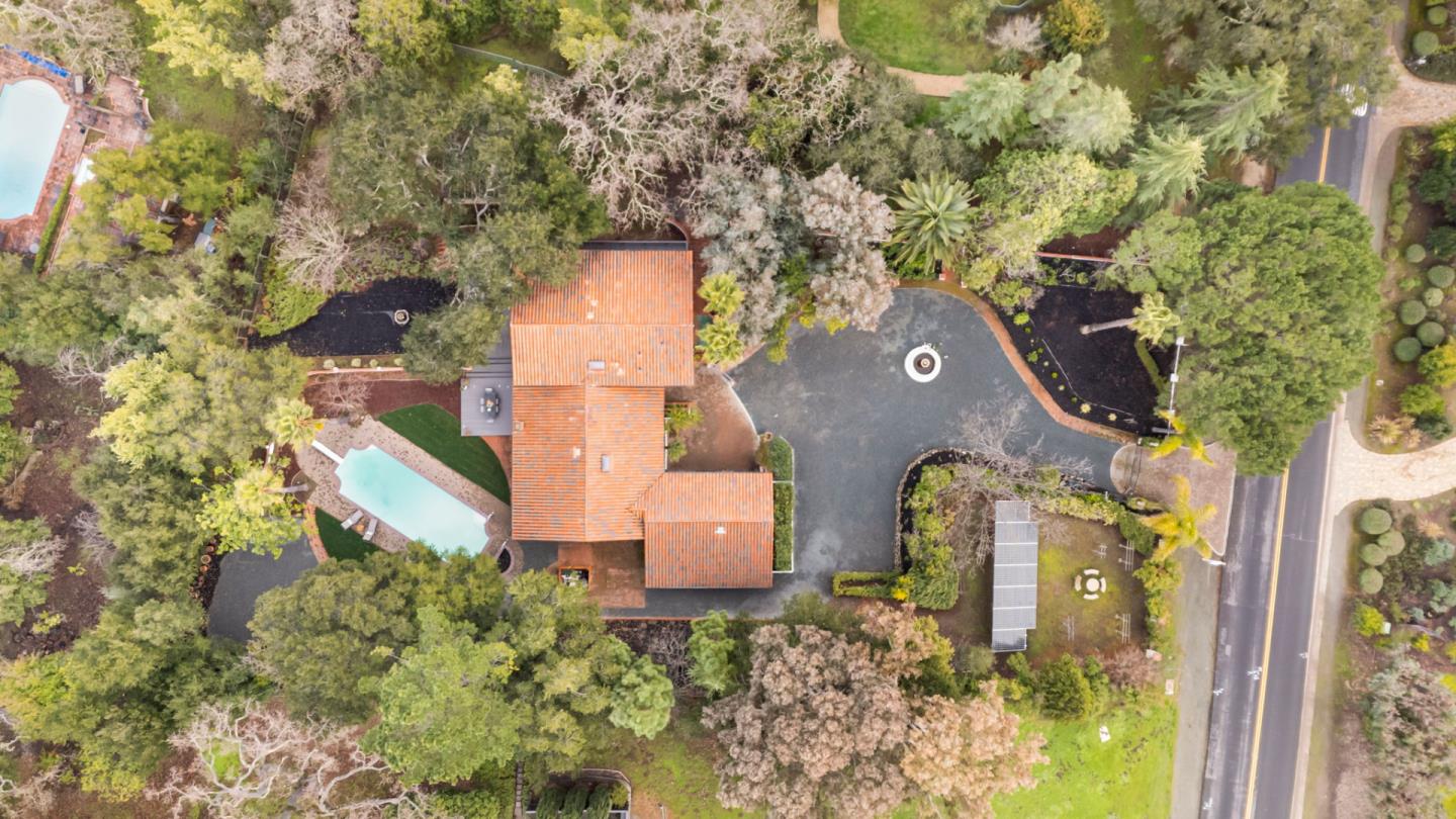 26645 Altamont Road Los Altos Hills, CA 94022 - Photo 53 of 60 an aerial view of a house with a yard and trees all around