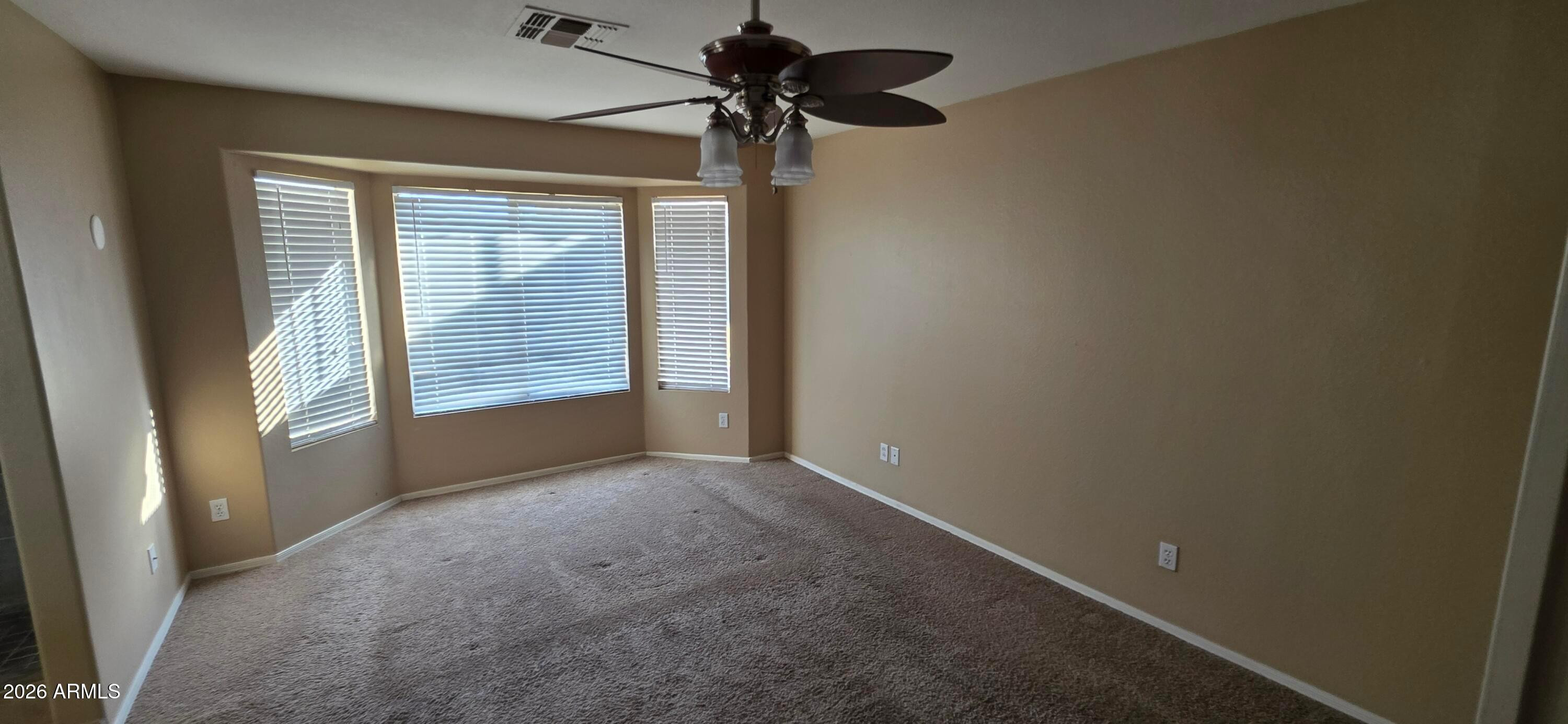 9163 West Davis Road Peoria, AZ 85382 - Photo 11 of 24 a view of a room with a window