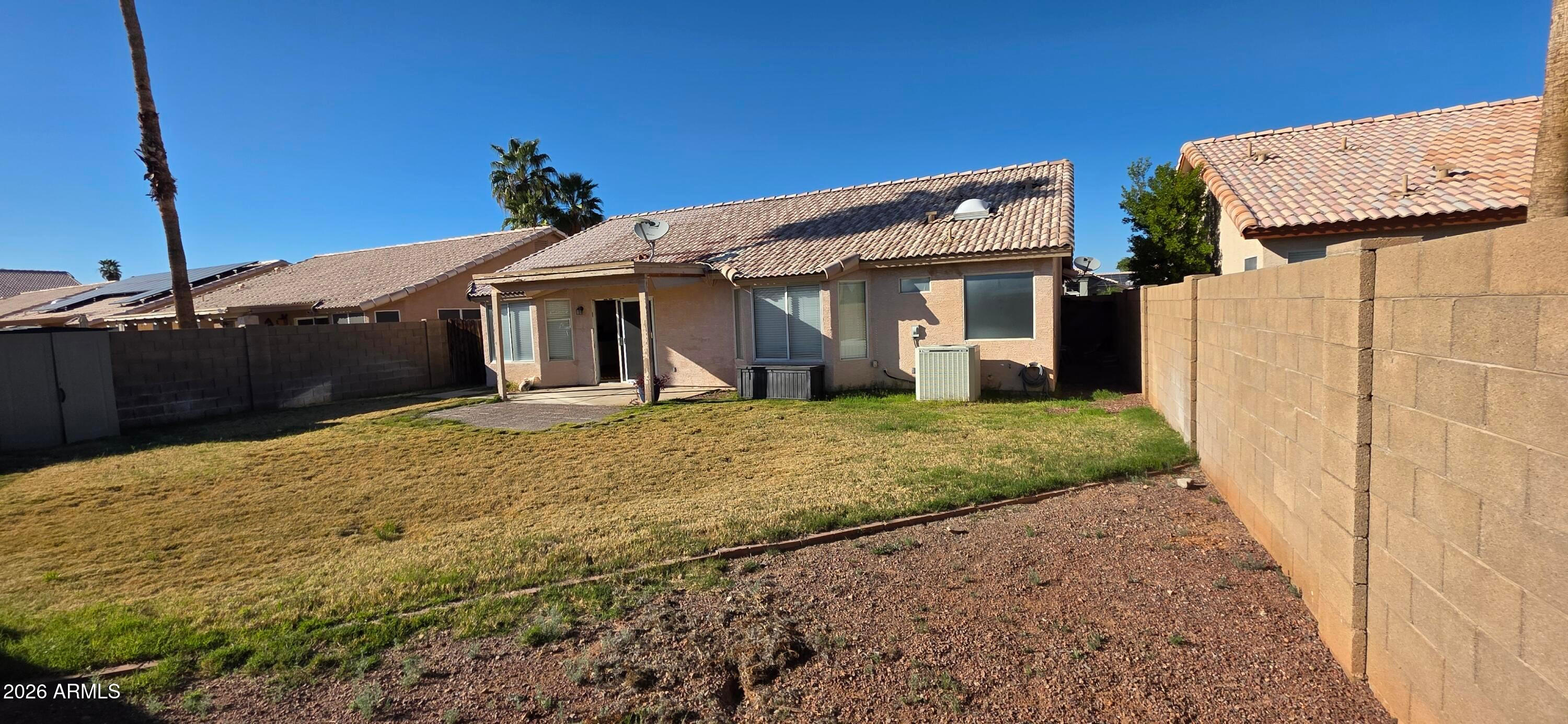 9163 West Davis Road Peoria, AZ 85382 - Photo 24 of 24 a front view of a house with a yard