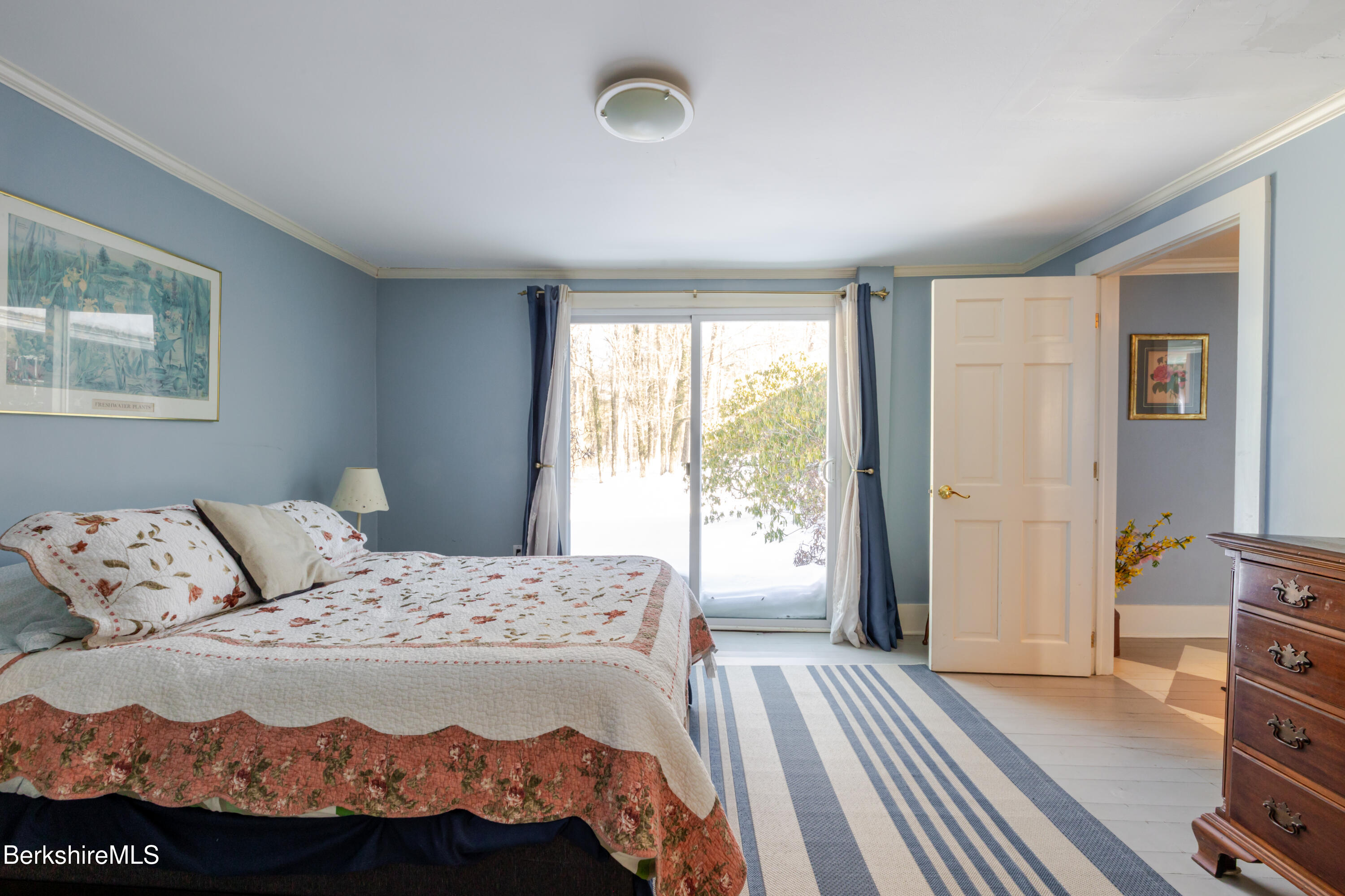 3 Lake Buel Road Great Barrington, MA 01230 - Photo 24 of 55 a bedroom with a bed and a dresser